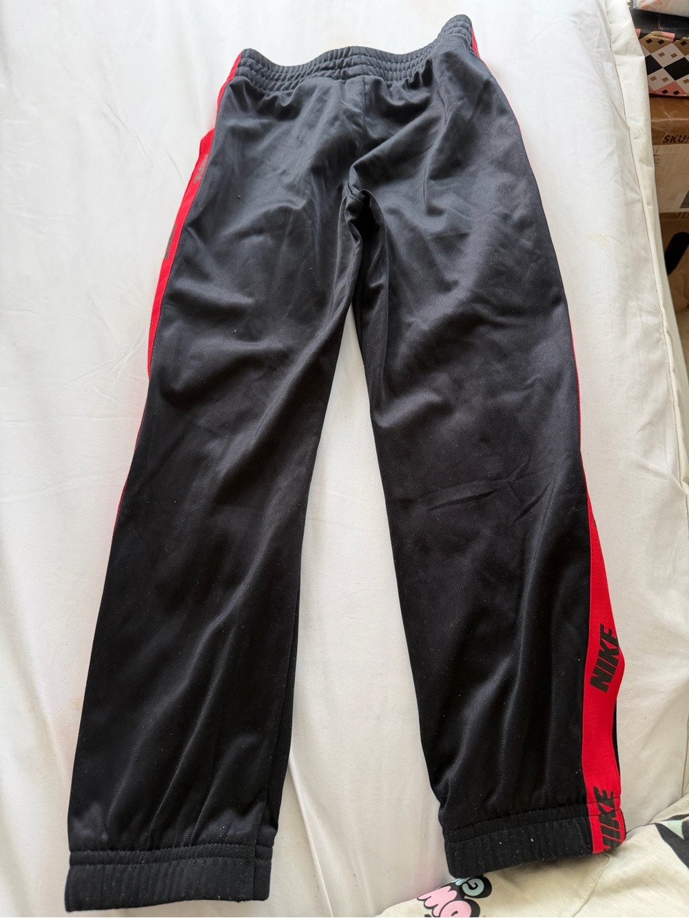 Nike Kids Black Track Pants with Red Side Panels